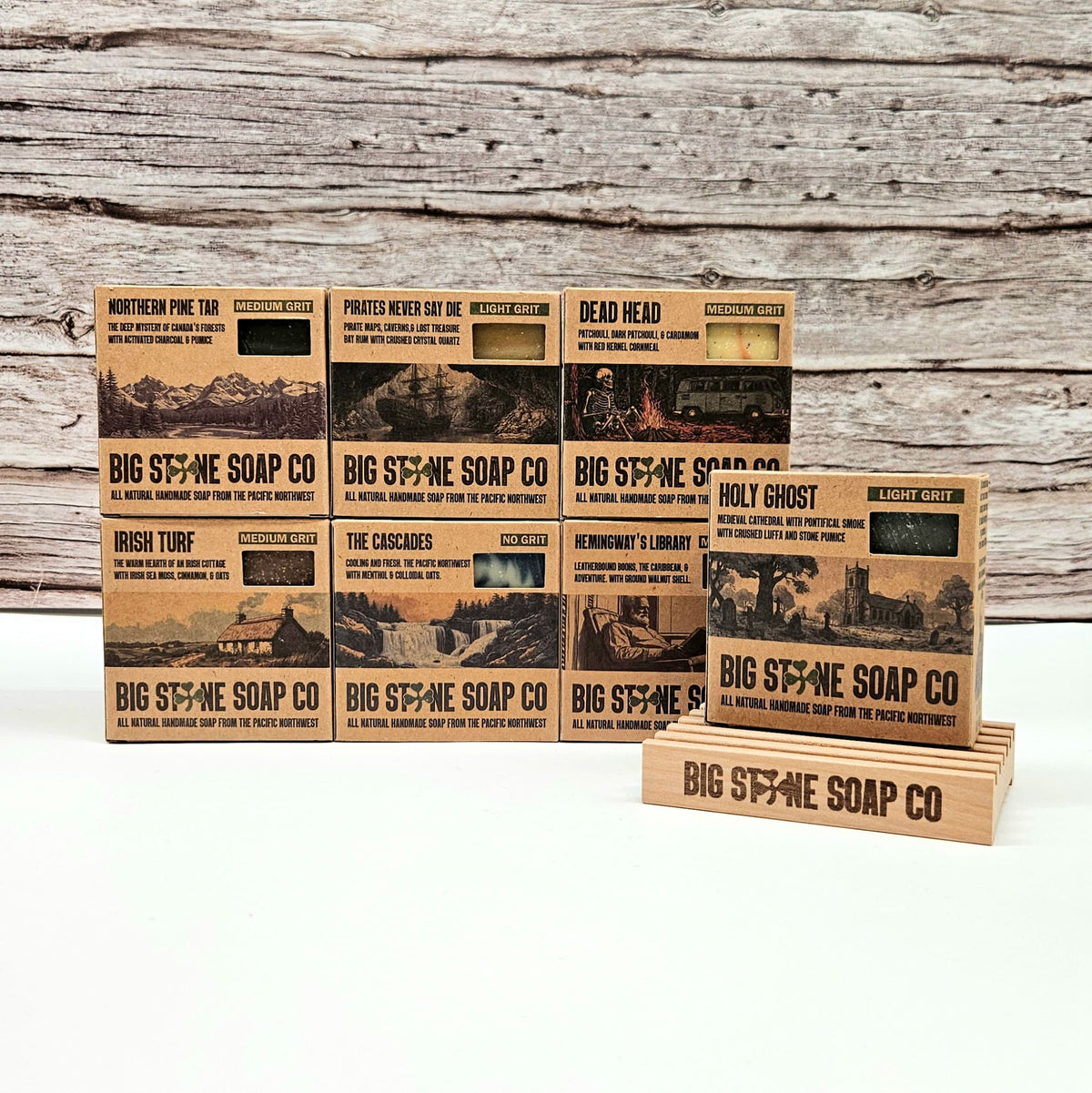 Farmer's Bundle flat lay of six Big Stone Soap Co. soap boxes with a free branded Alder wood soap dish
