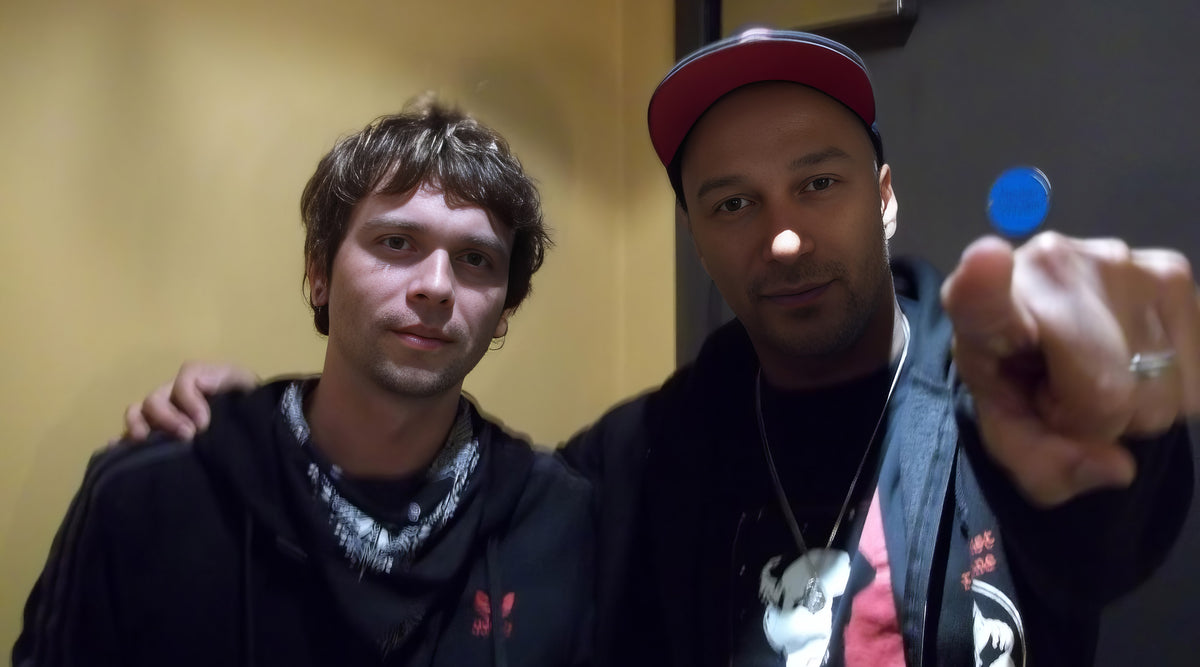 Big Stone Soap Co. founder Adam backstage with musician Tom Morello before a Rage Against the Machine show
