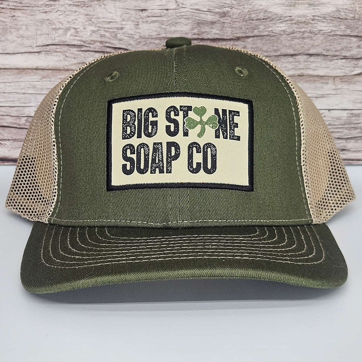 Big Stone Soap Co. trucker's hat in green, adjustable baseball cap with mesh back