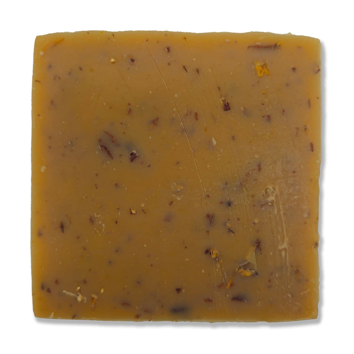 Hops + Barley Soft Scrub soap bar viewed from above, showing color and texture
