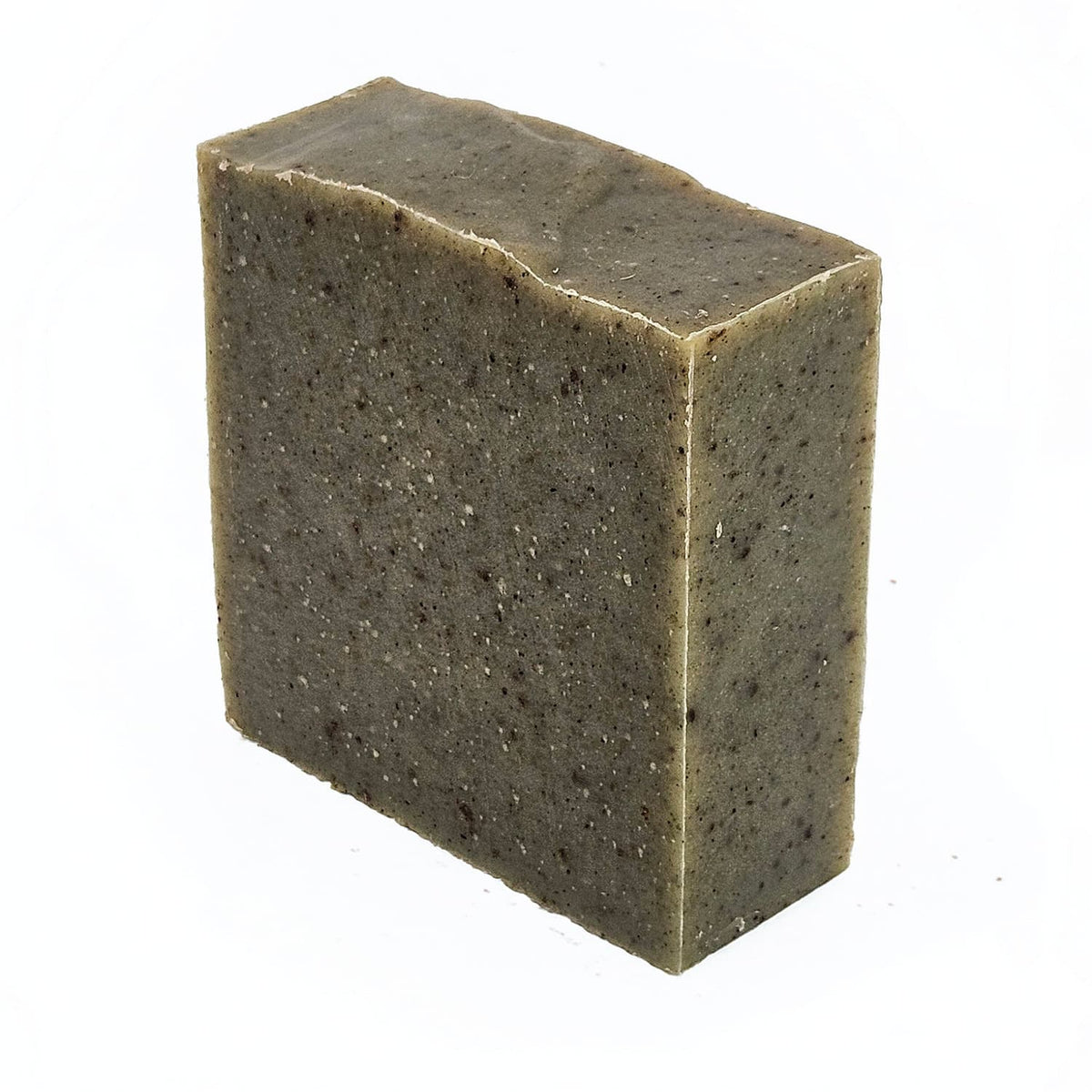 Unboxed bar of Triple Dog Dare natural handmade soap, a 1940s-Christmas-inspired bar with ground nutmeg, cinnamon and spirulina